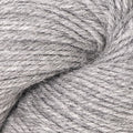 A close-up of light gray twisted yarn with a soft, fuzzy texture filling the frame.