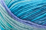 A close-up of variegated yarn with soft pastel stripes in aqua, blue, teal, and light purple.