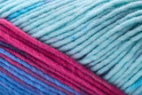 Close-up of a skein of variegated yarn with stripes of light blue, teal, magenta, and purple.