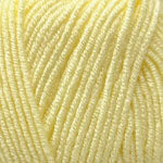 A close-up of pale pastel yellow yarn strands filling the frame.