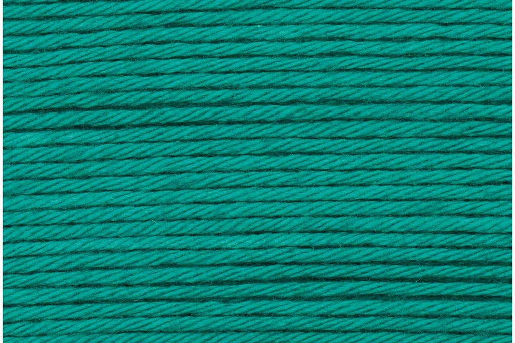 A close-up texture shot of teal green braided cord or thread, filling the entire frame.