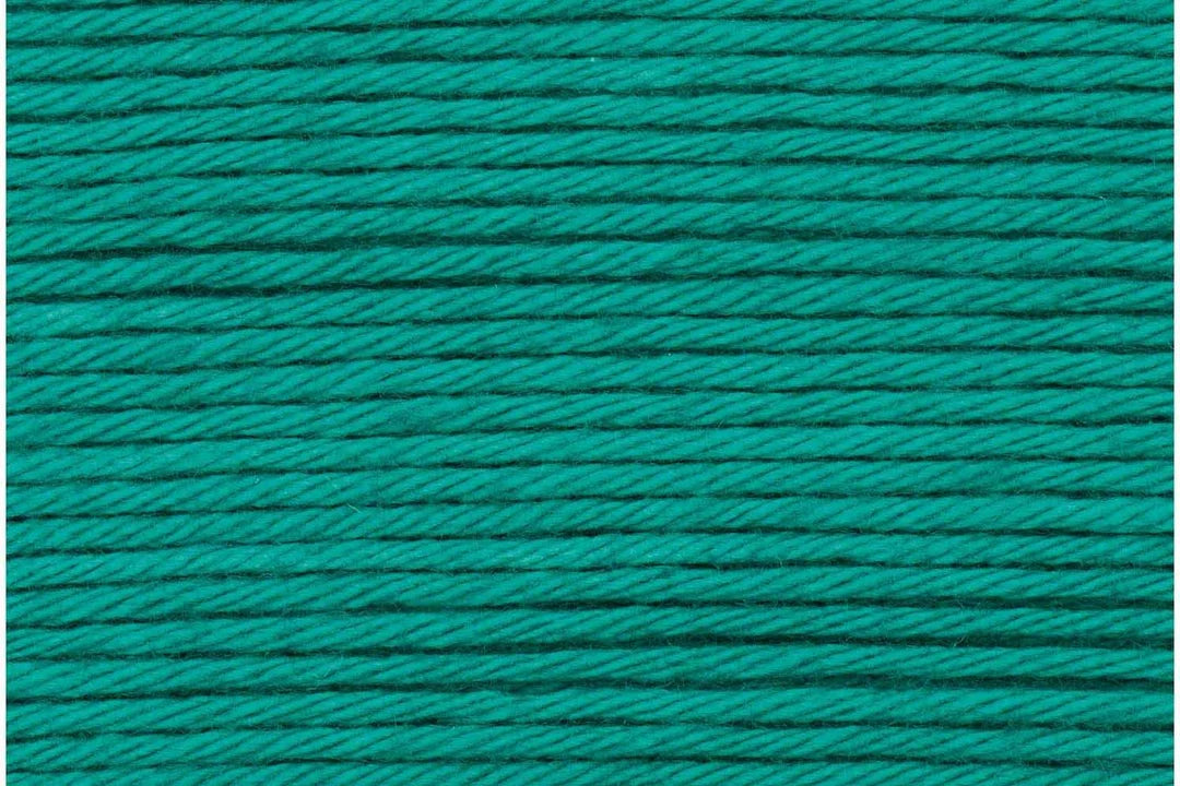 A close-up texture shot of teal green braided cord or thread, filling the entire frame.