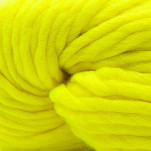 A close-up of bright neon yellow fluffy yarn wound into a skein.