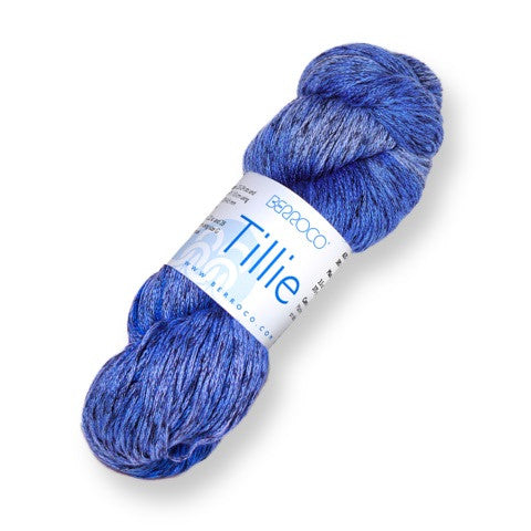 A single skein of variegated blue yarn with a white paper label reading 'bamboo Tillie' on a clean white background.