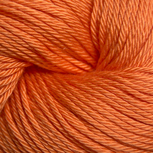 Close-up of a ball of orange yarn
