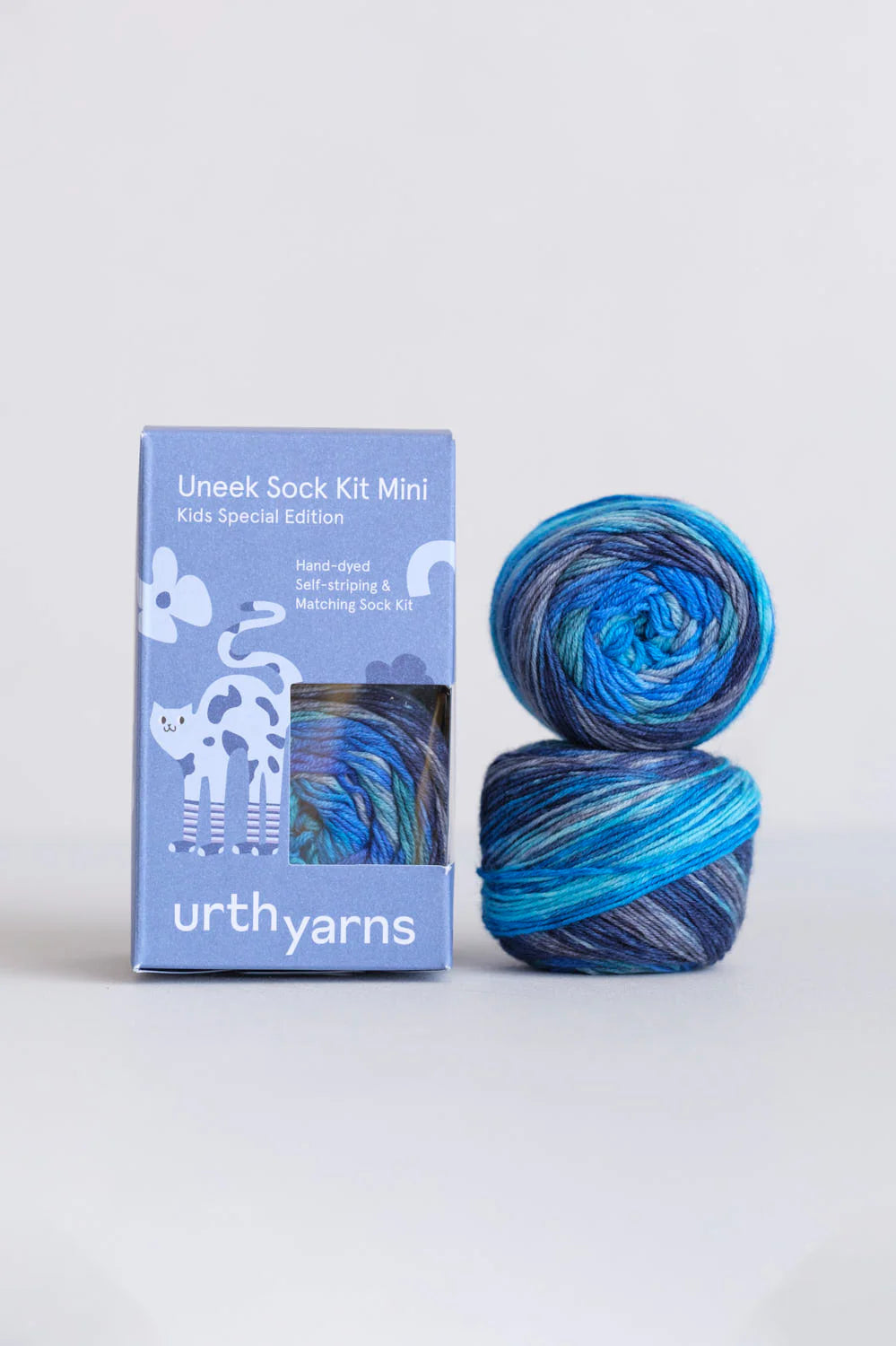 Urth Yarns linen sock kit with yarn balls on a white background