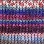 A close-up of a knitted fabric with horizontal stripes in multiple colors including pink, purple, blue, red, and gray.