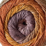 Spool of multicolored yarn with shades of brown and orange.