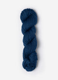 Blue skein of yarn on a white background