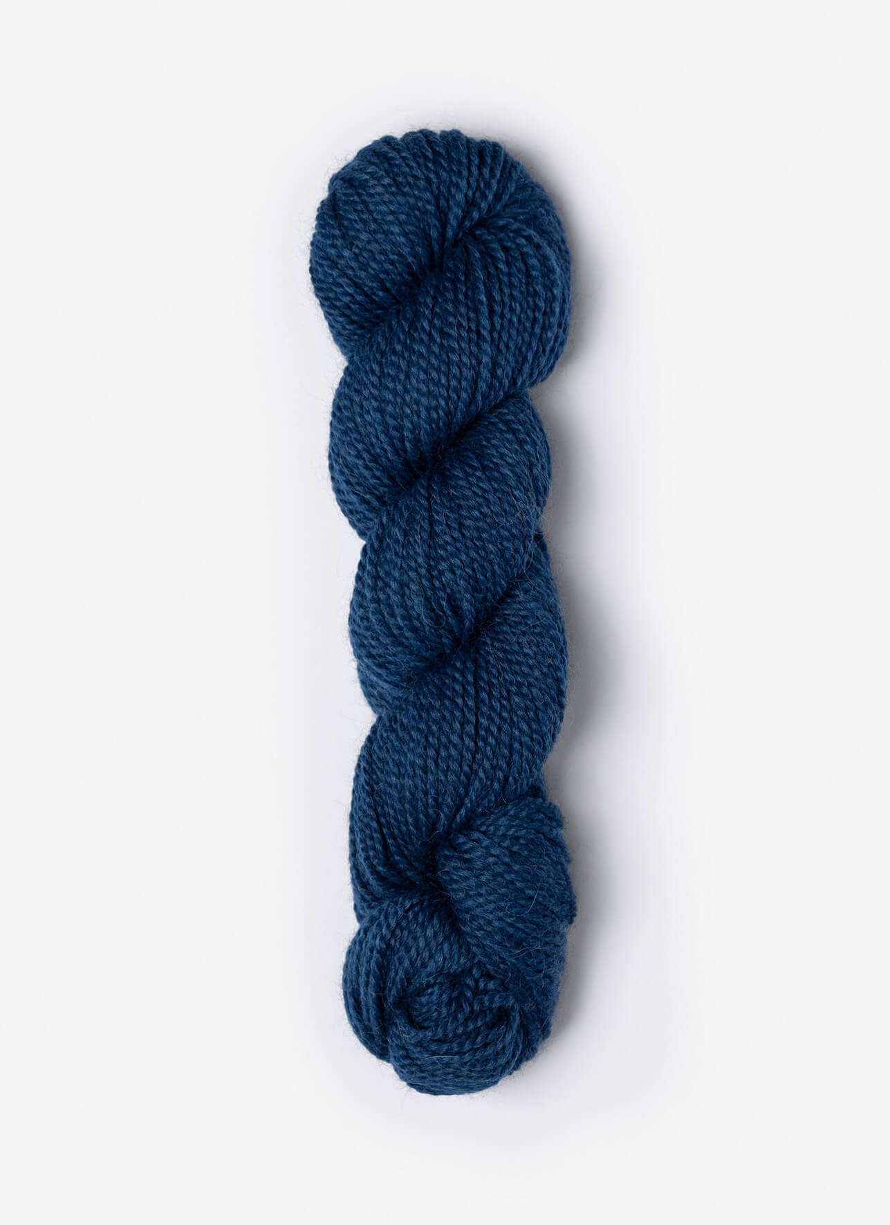 Blue skein of yarn on a white background