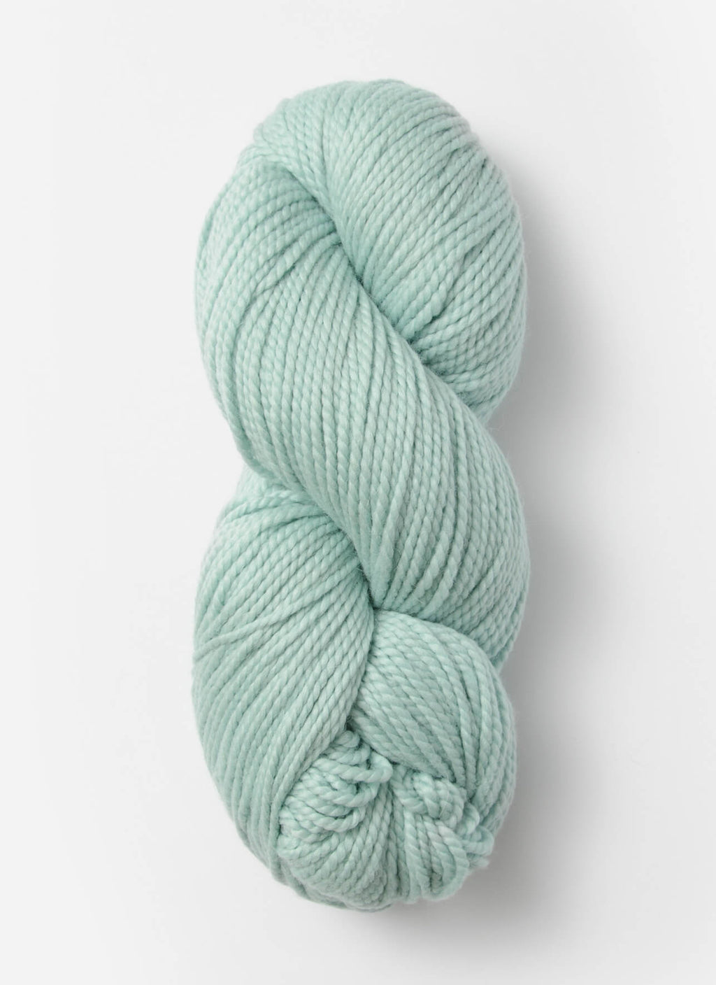 Light green skein of yarn on a white background