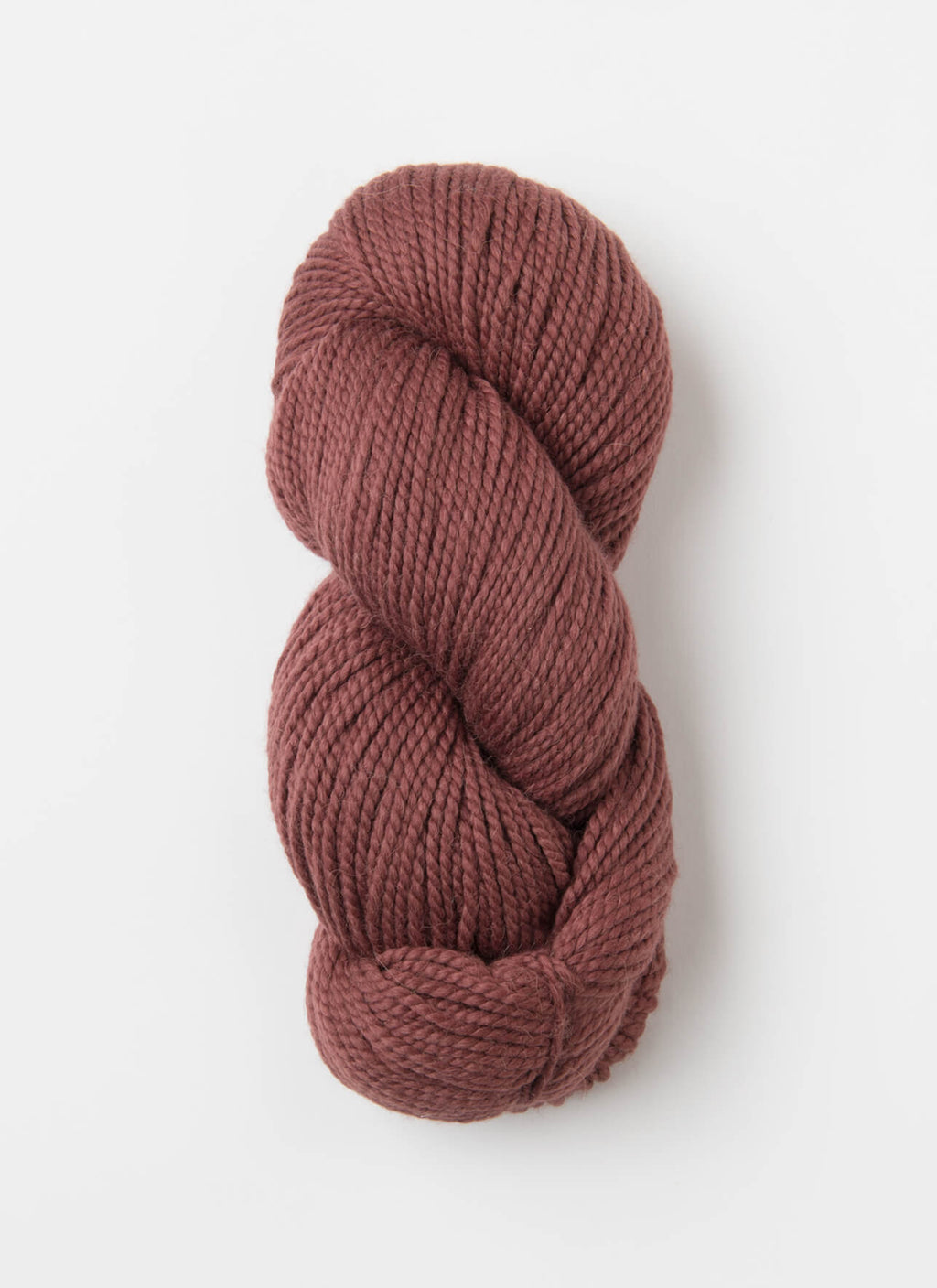 A skein of dusty rose mauve yarn, twisted into a standard hank, photographed on a clean white background.