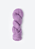 Purple skein of yarn on a white background