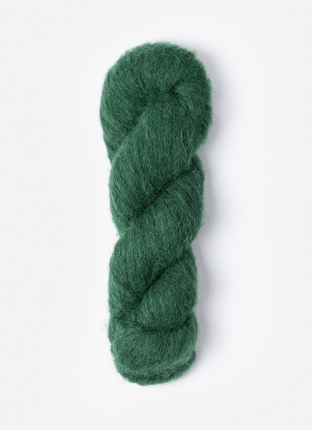 Green skein of yarn on a white background