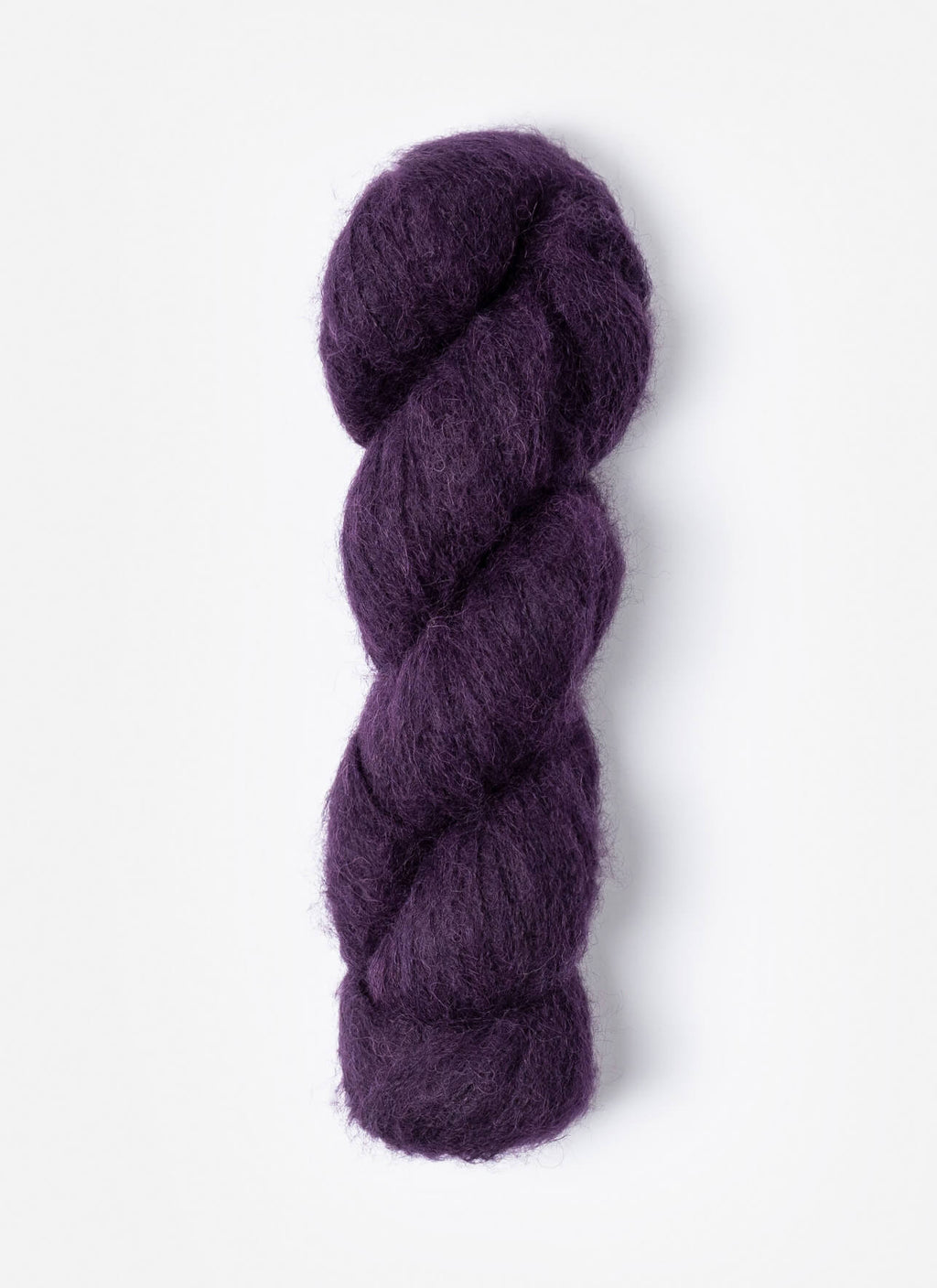 Purple skein of yarn on a white background