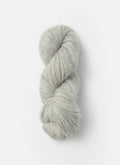 Light gray skein of yarn on a white background