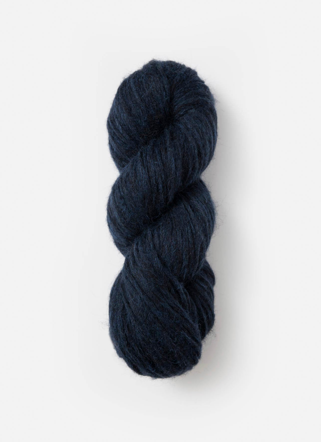 A single skein of dark navy blue yarn, twisted into a classic hank, shown against a clean, light off-white background.