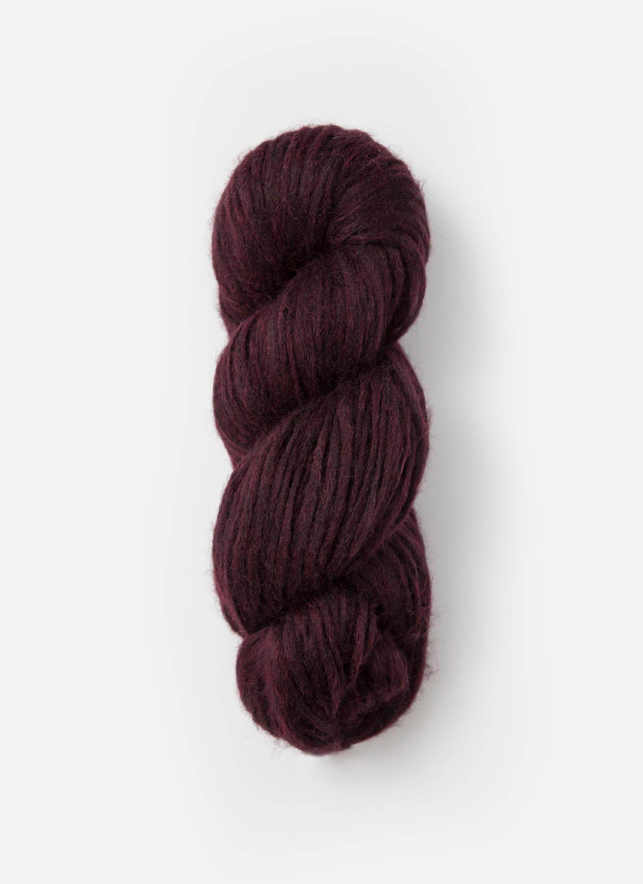 A single skein of dark plum purple yarn, twisted into a classic hank, displayed against a clean, light off-white background.