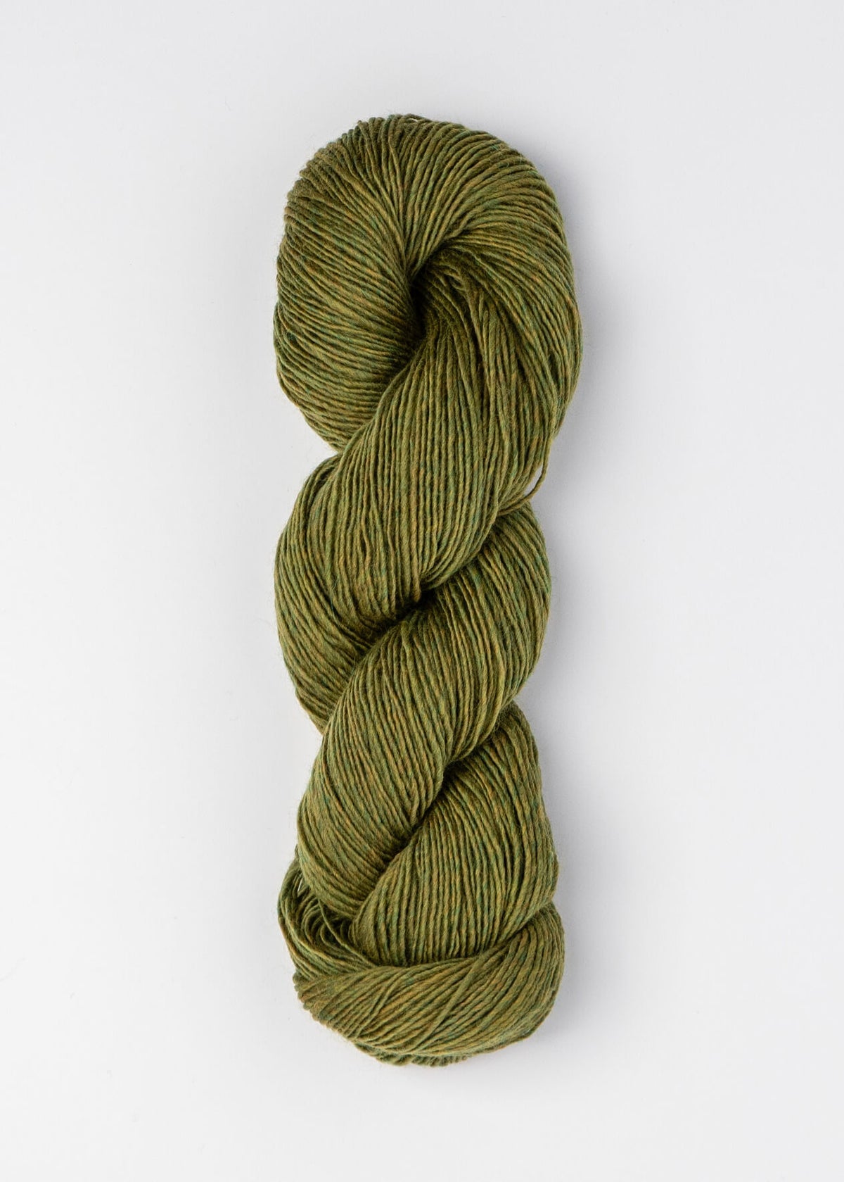 Green skein of yarn on a white background
