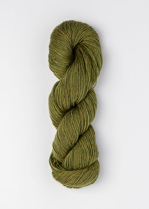 Green skein of yarn on a white background