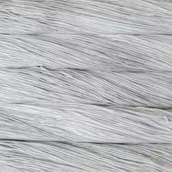 A close-up texture shot of light gray and white twisted yarn or cord strands filling the frame.