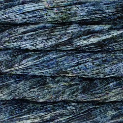 A close-up texture of dark, layered stone or wood grain with horizontal striations in charcoal gray, black, and subtle blue-green undertones.