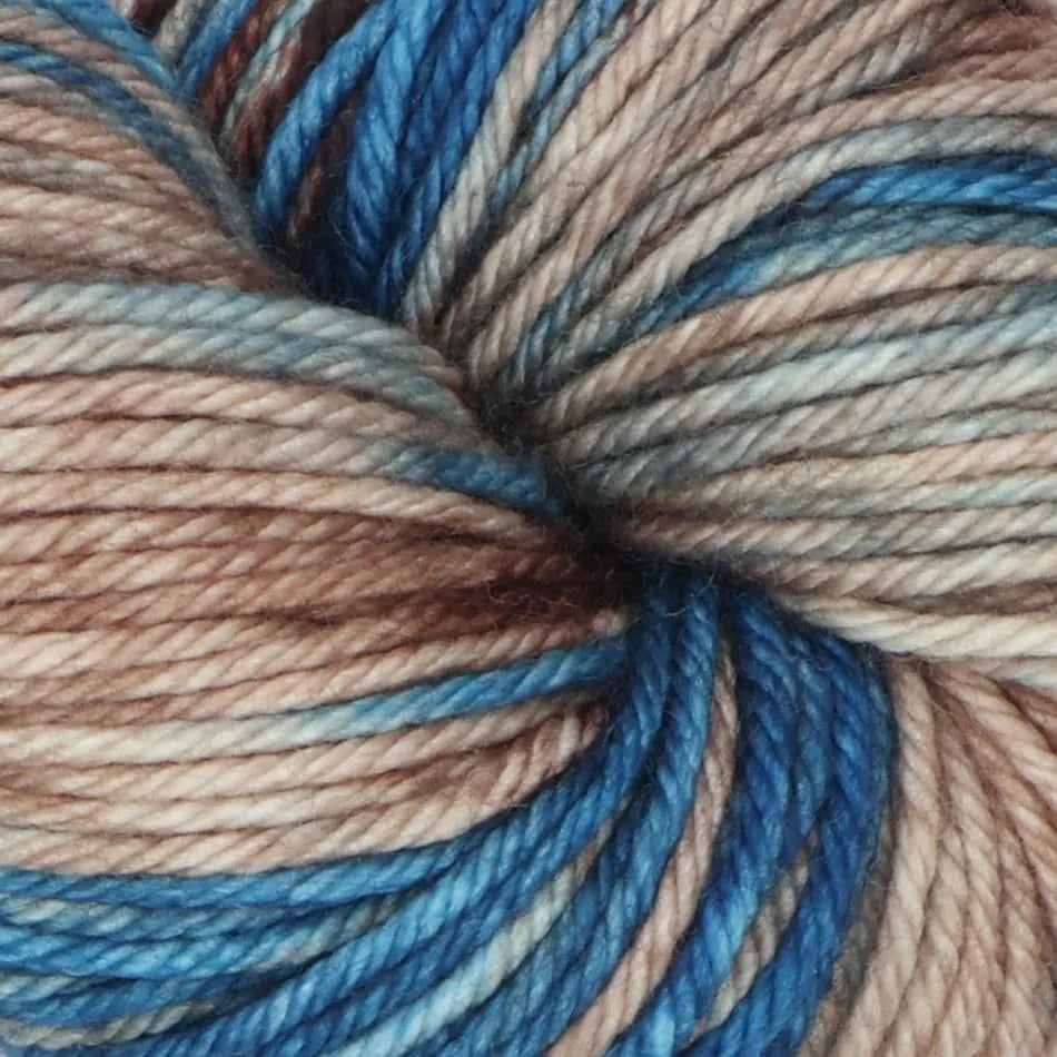 Close-up of a skein of yarn with blue and brown tones