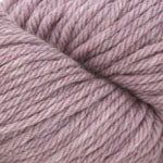 Ball of pink yarn on a white background
