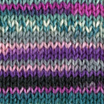 A close-up of a knitted fabric with horizontal stripes in teal, purple, pink, and black yarn.
