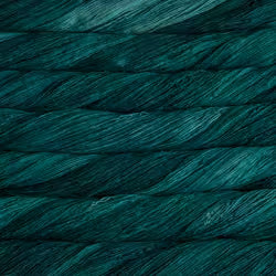A close-up texture shot of dark teal yarn wound tightly into twisted strands, filling the entire frame.