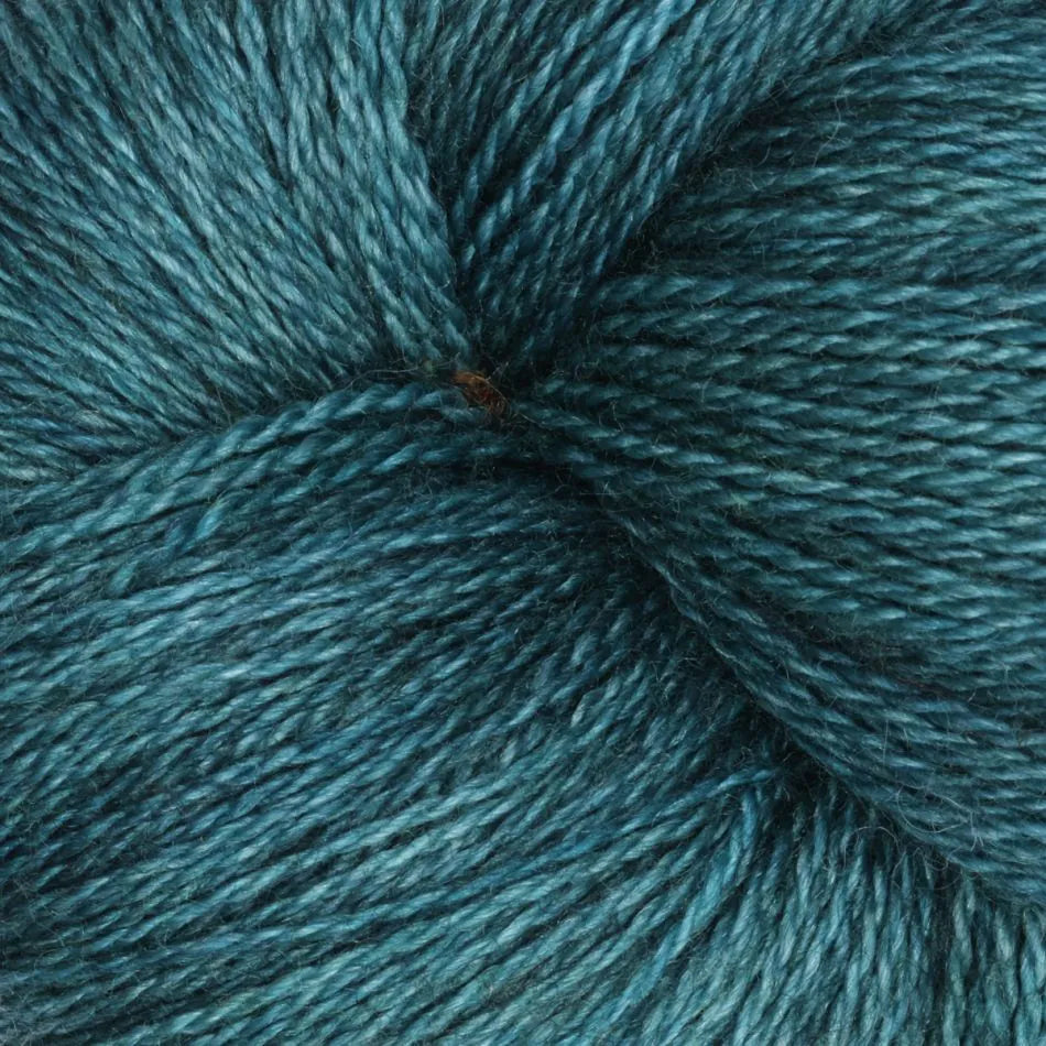 Close-up of a ball of teal yarn