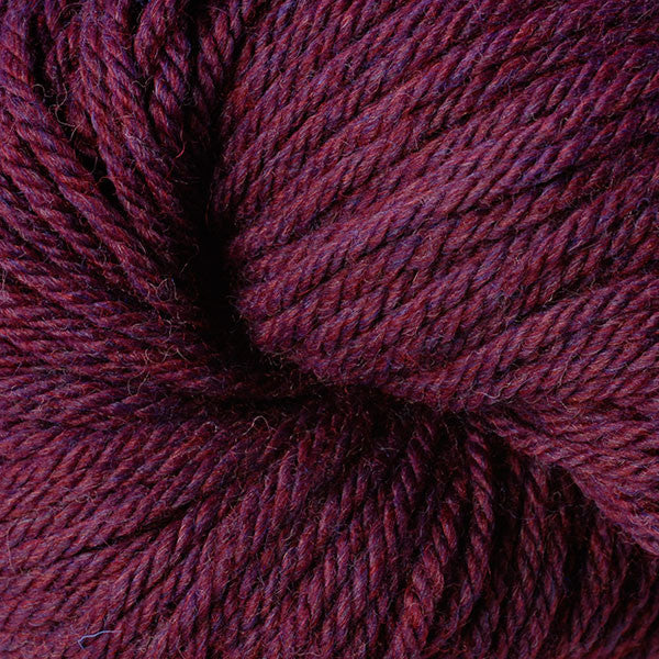 Close-up of a ball of dark purple yarn