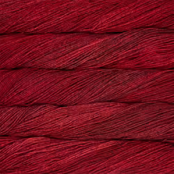 A close-up texture shot of deep red yarn strands, showing the color and fiber detail.