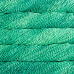 Close-up of teal yarn with a textured surface