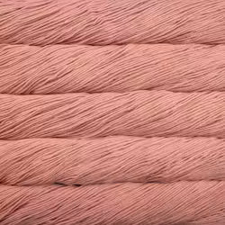 A close-up texture shot of dusty rose pink yarn wound horizontally.