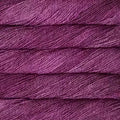 Close-up of purple yarn with a textured surface