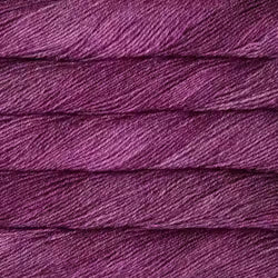 Close-up of purple yarn with a textured surface