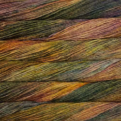 A close-up texture shot of a fabric or material with a diagonal striped pattern in earthy tones of olive green, brown, mustard yellow, and rust orange.