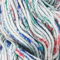 Close-up of a multicolored yarn skein with white, blue, green, and red fibers mixed together.