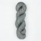 A single skein of gray yarn photographed against a plain white background.