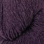 Close-up of dark purple yarn with a textured surface