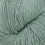 Teal skein of yarn on a white background