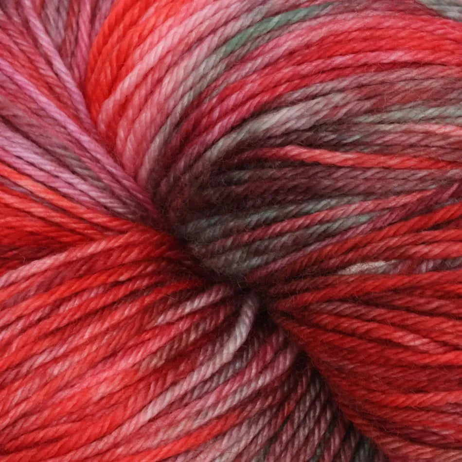Close-up of a ball of red and gray yarn