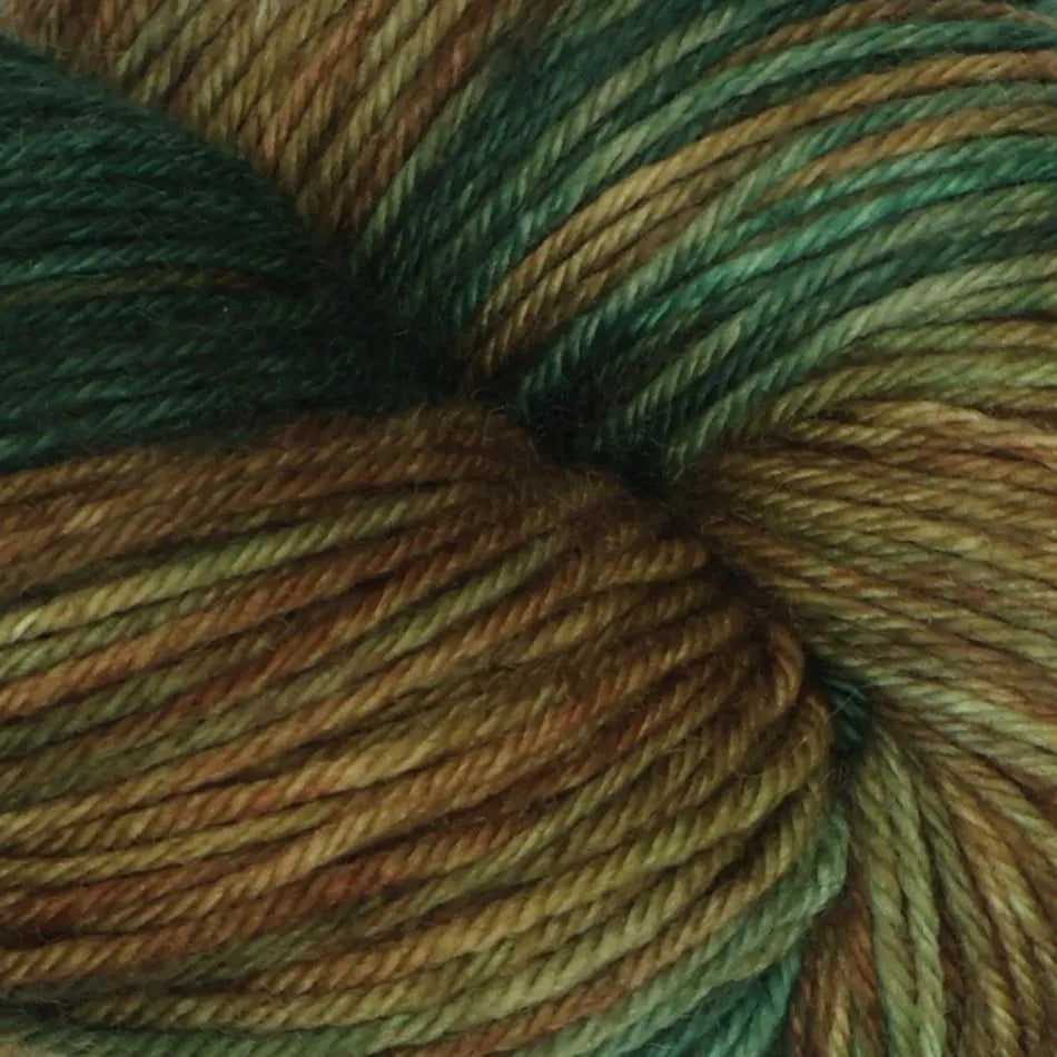 Close-up of multicolored yarn skein with shades of green and brown.