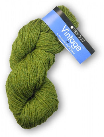 Green skein of yarn with a 'Vice' label on a white background